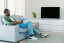 Man Watching TV to Self-Care After ERP Treatment